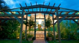 Entrance to The Brasserie at Cricket Square, a restaurant serving locally sourced produce in Grand Cayman.