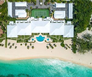 Aerial view of The Pinnacle and its outdoor facilities on Seven Mile Beach.