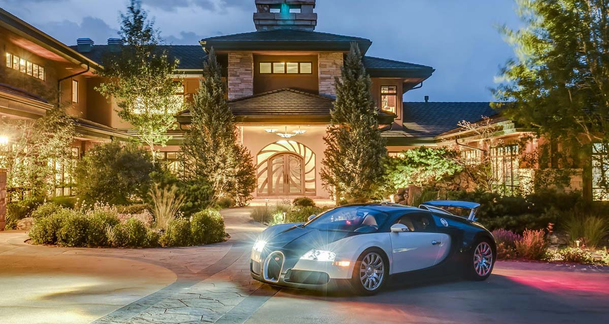 Front entrance to 'Thunder Ridge¡ with super car in the foreground.