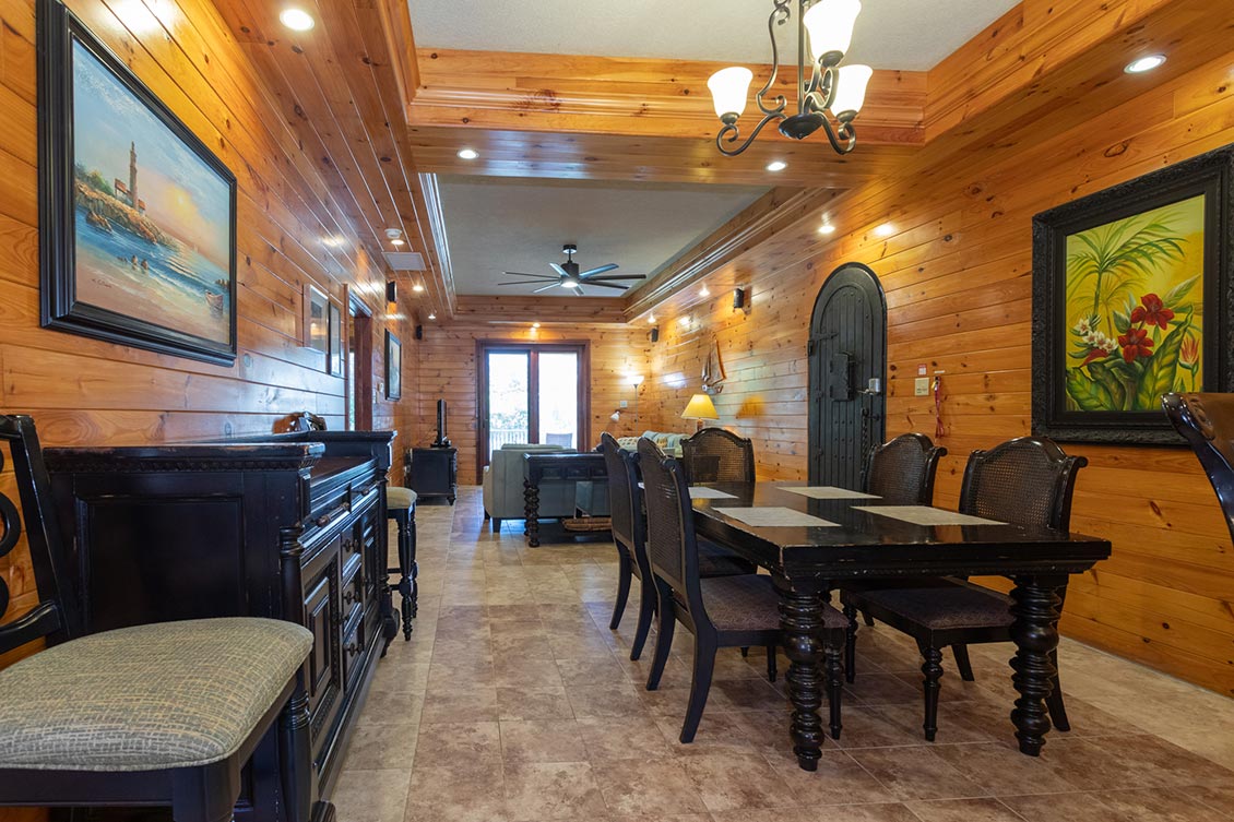 Wood panelled dining room in Lighthouse Point in Grand Cayman.