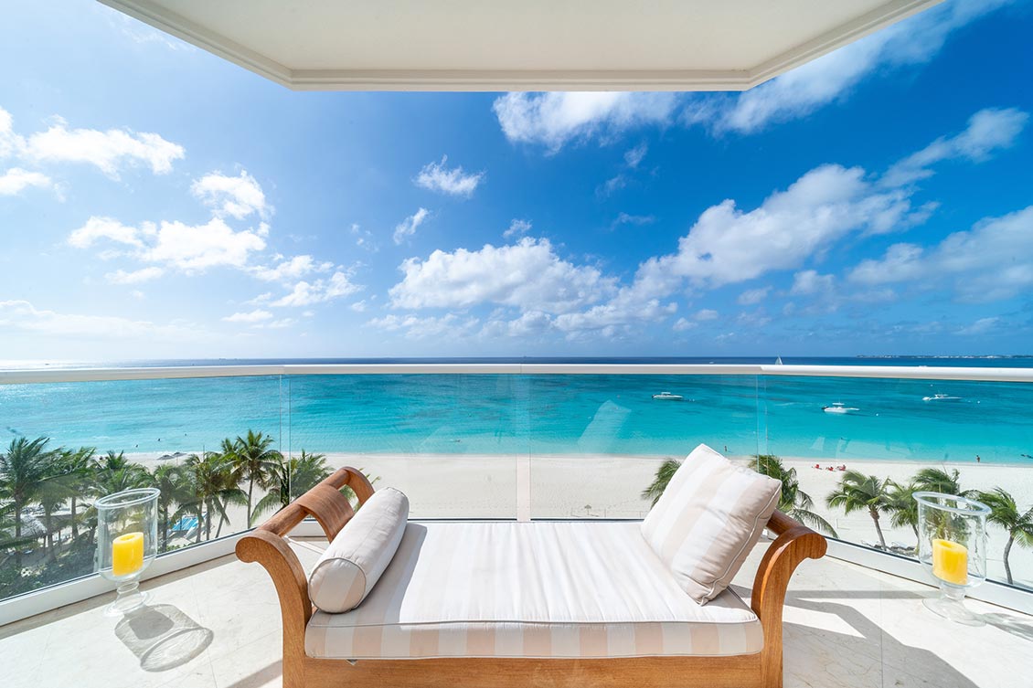 View of Caribbean Sea from terrace of Waters Edge on Seven Mile Beach, Grand Cayman.