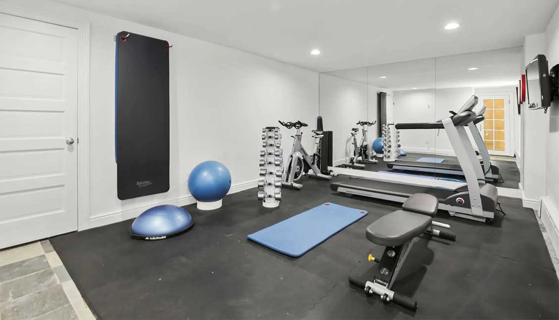 Home gym in a property in a Greenwich, Connecticut home. Listed by the Greenwich branch of Sotheby's International Realty.