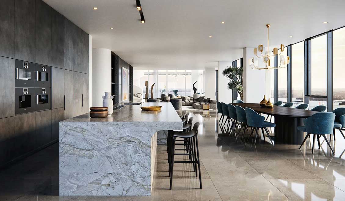 A modern kitchen and dining area in a property listed in Auckland, New Zealand by Sotheby's International Realty.