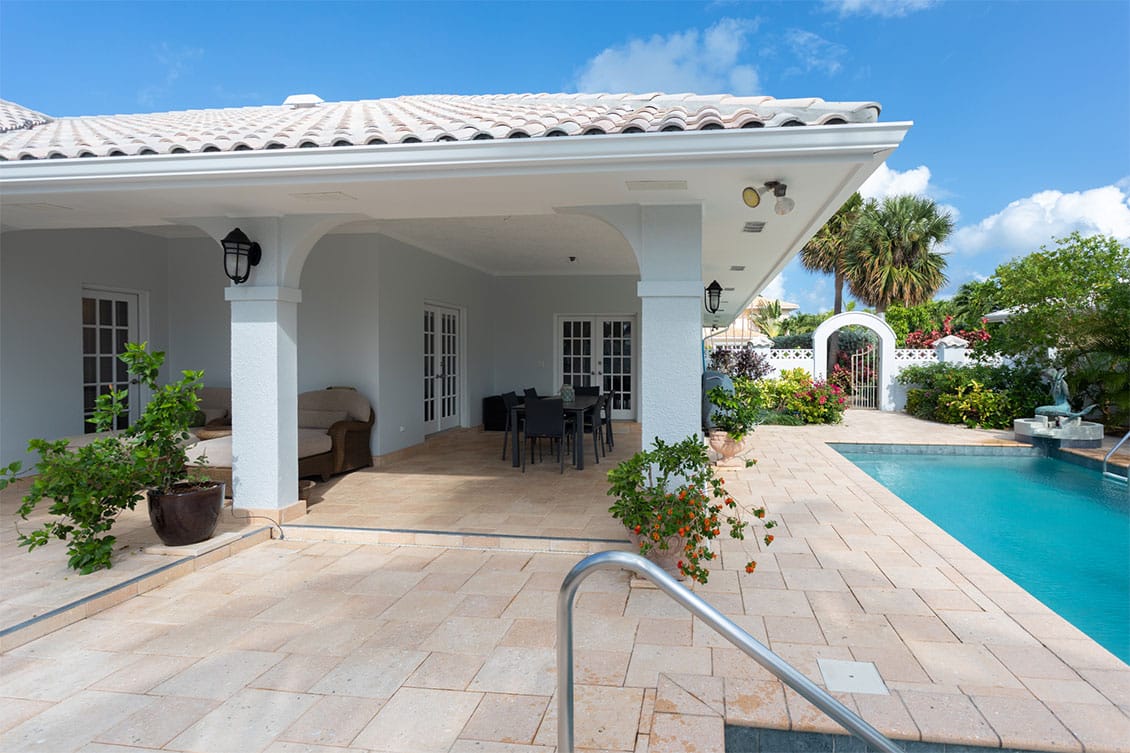 Rear covered patio and pool area.