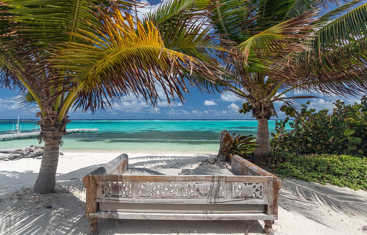 A sunbed on the beach with sweeping Caribbean Sea Views at Stepping Stone Villa in Grand Cayman.