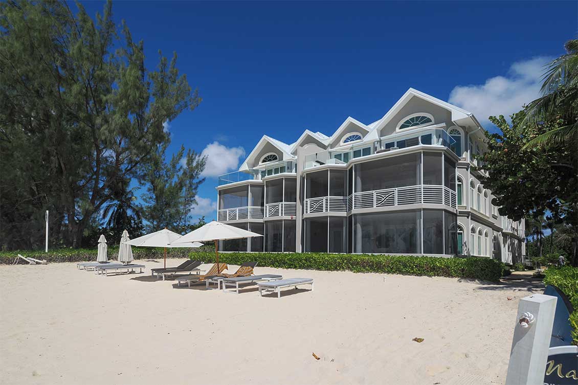 A rear elevation view of the private beach area at Mandalay on Seven Mile Beach.
