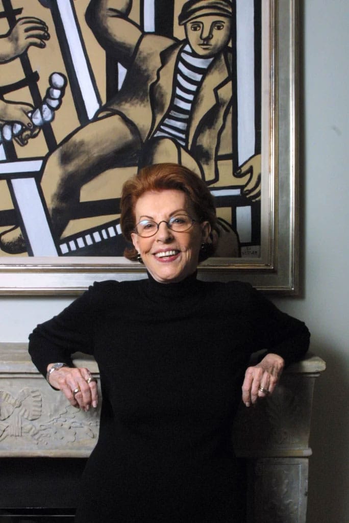 EMILY FISHER LANDAU IN FRONT OF FERNAND LEGER'S ETUDE POUR LES CONSTRUCTEURS IN HER HOME IN MANHATTAN IN 2002. PHOTO BY CHESTER HIGGINS JR./THE NEW YORK TIMES/REDUX. 2023 ARTISTS RIGHTS SOCIETY (ARS), NEW YORK / ADAGP, PARIS