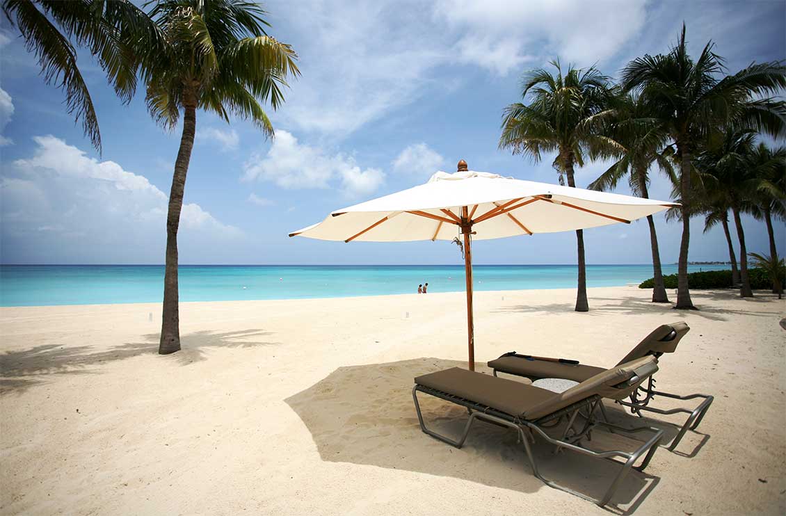 The glorious white sands of Seven Mile Beach in the Cayman Islands.