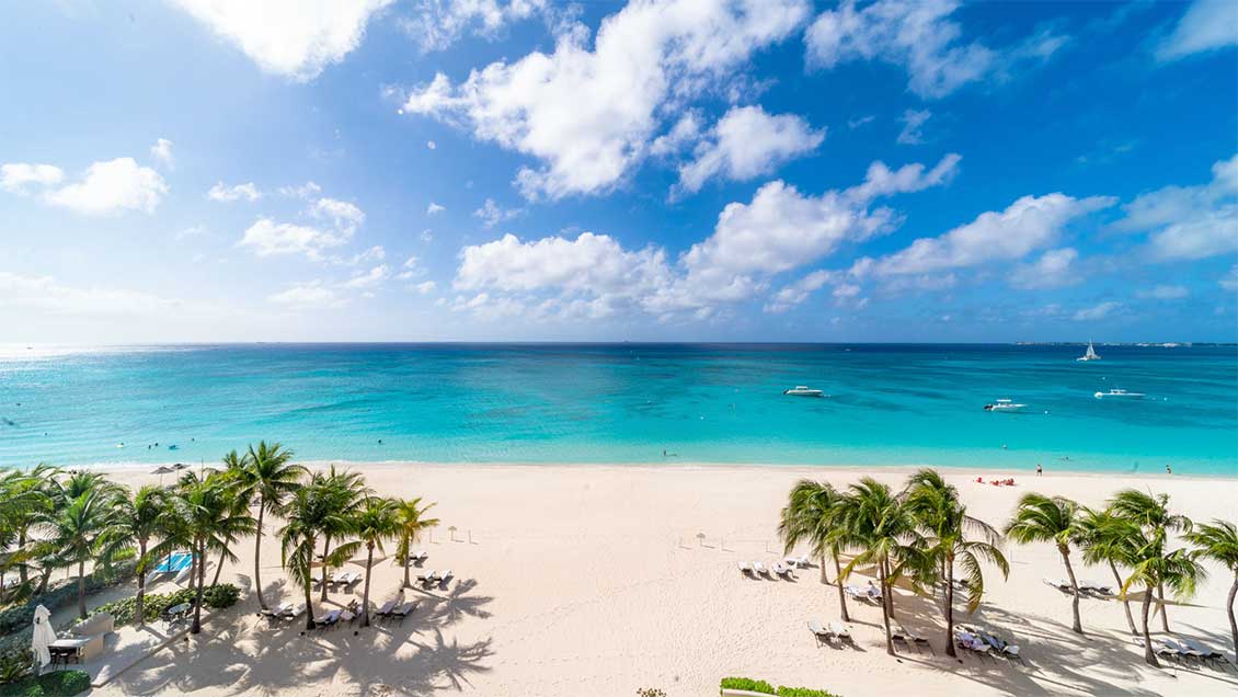 Picture-perfect beach views from Waters Edge, Grand Cayman