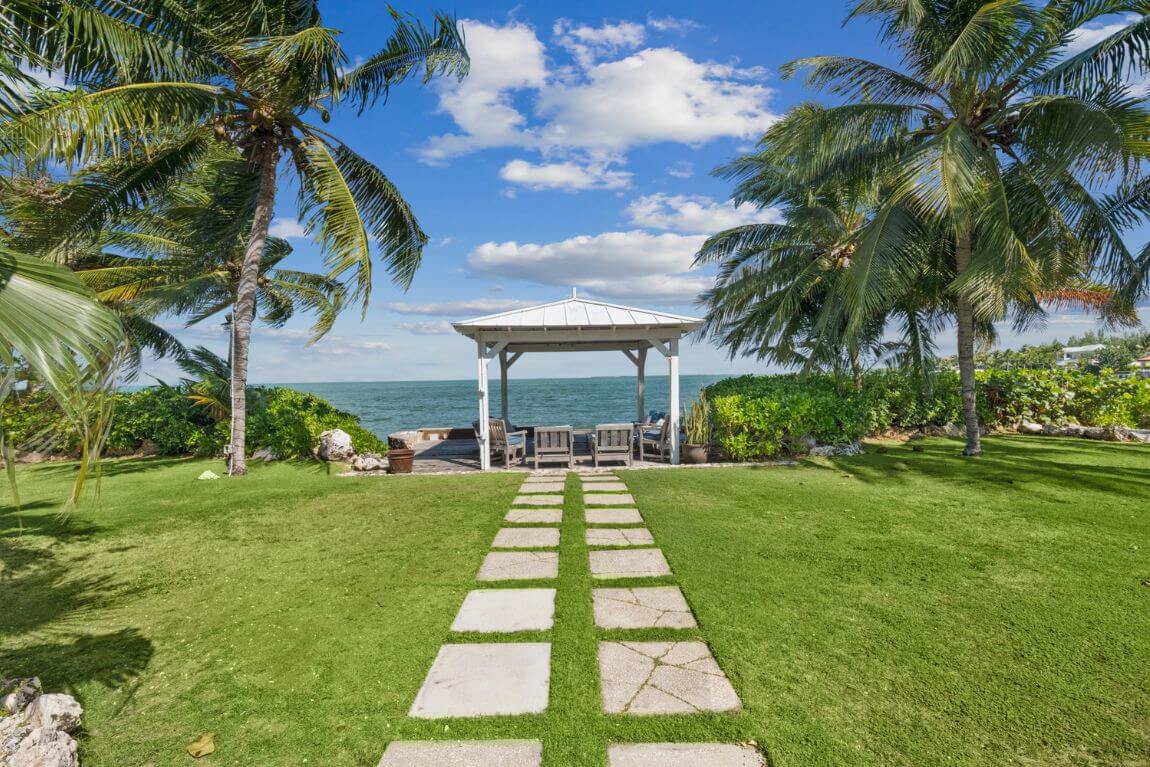 Lush gardens and private dock