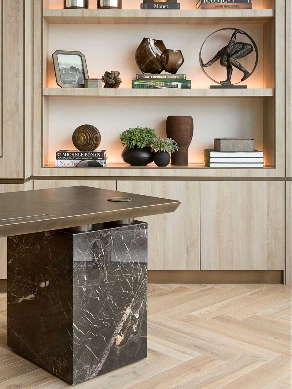 Marble and metal contrast with the lighter timber of the cabinetry and flooring in Laura Hammett’s Bahamas project. Photograph: Julian Abrams