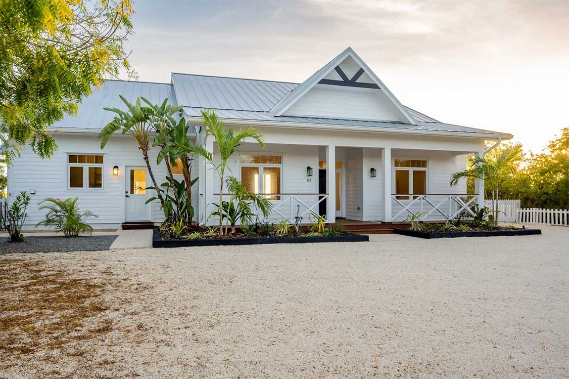 Perched above the Caribbean Sea, this elevated oceanfront property enjoys uninterrupted views over the island's striking ironshore coastline.