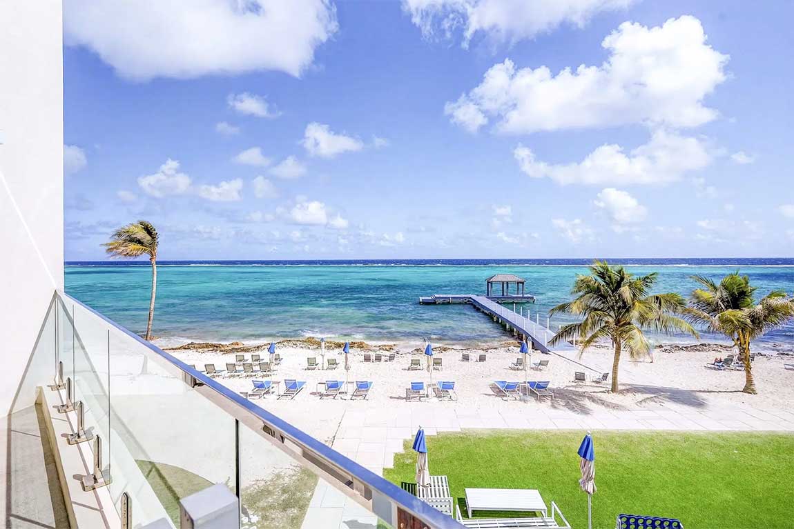 Morning coffee. Endless Caribbean views. Life at Rum Point Resort Residences is all about slowing down and enjoying the beauty of Grand Cayman