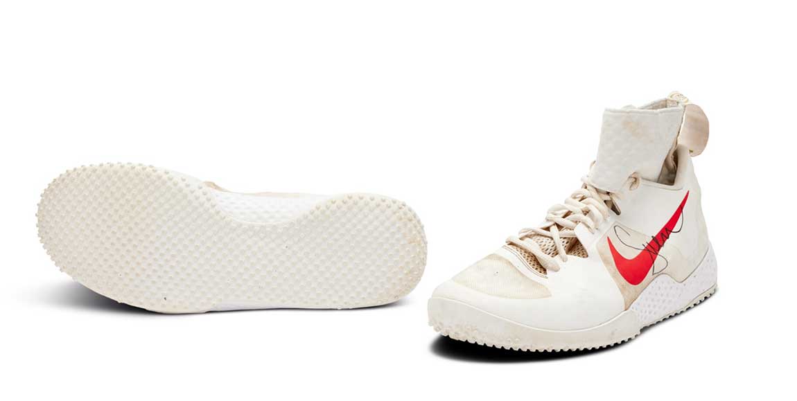 SERENA WILLIAMS 2018 WIMBLEDON MATCH WORN AND DUAL-SIGNED SNEAKERS. ESTIMATED 8,000 - 12,000 USD.